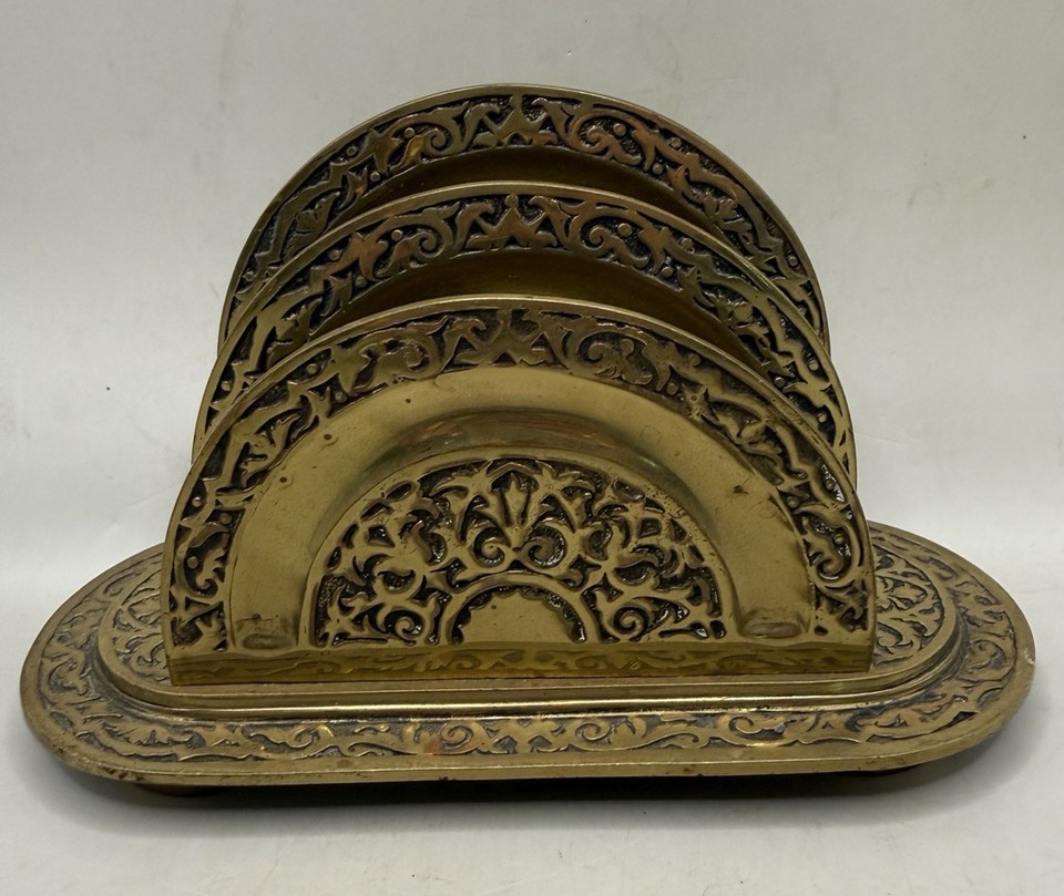 A German Art Nouveau brass letter rack dripping with ornate fin-de-siècle detail — the kind of piece that stops visitors mid-sentence.