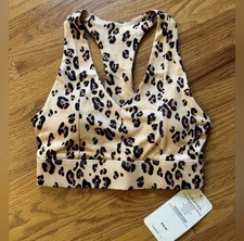 Image of Fabletics On The Go Midi Medium Impact Leopard Print Sports Bra In Size XXS-NEW