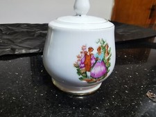 Vintage "Miniature white porcelain tea set with courting couple motif and gold