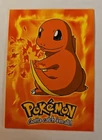 1999 Topps Pokemon #04 CHARMANDER Movie Card E4 Blue Topps Logo - 1st edition