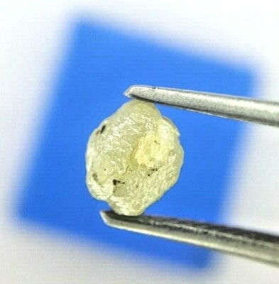 Uncut rough diam 1.16tcw grayish yellow sparkling natural spherical ball shape 