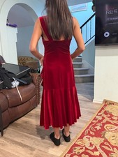 AI Overview    This is a red velvet ruched cami formal or party dress with a ruf