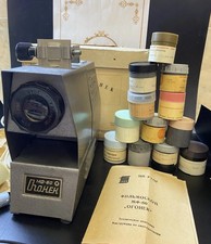 VINTAGE Diafilm projector desktop Filmoscope  Ogonyok80  and 12 filmstrips Soviet