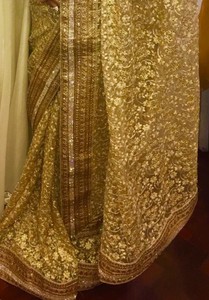 golden colour saree party wear