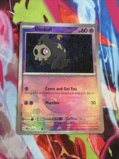 Pokémon Prismatic Evolutions #35/131 Duskull Poké Ball Holo
