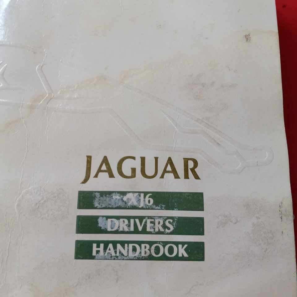 Juego manual del propietario Jaguar XJ6 1990 vintage con carpeta de cubierta. Algunos daños por agua Foto 4 de 4