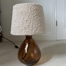 Pooky Smaller Wobble Bottle Table Lamp in Briwn Hammered Glass