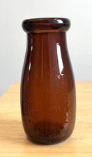 EARLY AMBER RND EMB HALF PINT WEBER MILK CO BUTTER MILK BOTTLE INDIANAPOLIS, IND