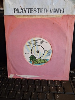 ZAP POW THIS IS REGGAE MUSIC / BREAK DOWN THE BARRIERS ISLAND EX 7'' VINYL 45
