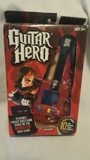 Guitar Hero playable pocket-sized game based on the monster video game 10 tracks