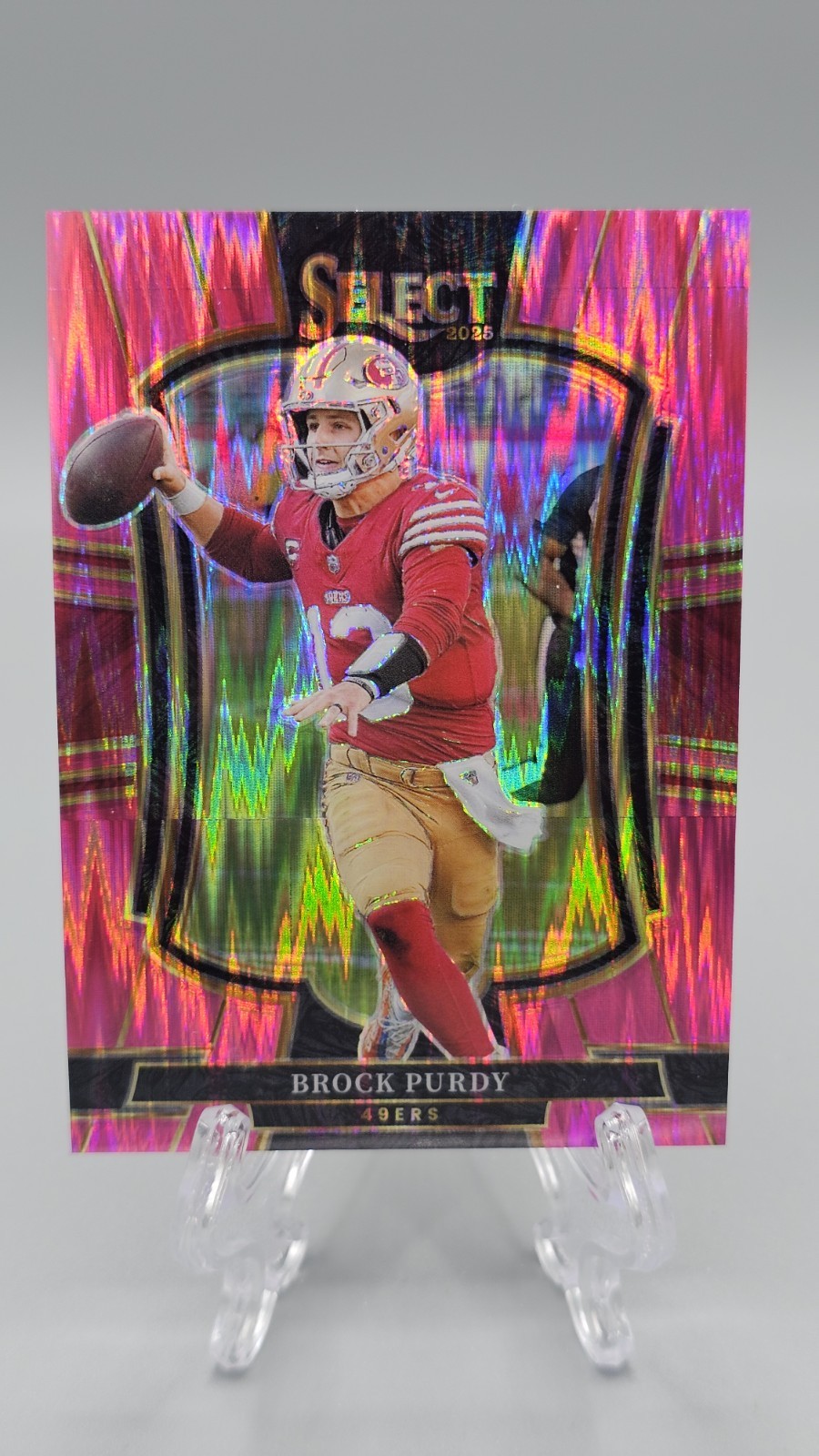 2025 Panini Select - Premier Level Brock Purdy #117 Pink Shock Prizm