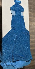 Blue sequin prom dress with high neck and open back. Worn once 