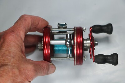 Vintage Abu Ambassadeur 5000 Red 4 Screw Fishing Reel for sale