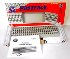 TWO LIONEL FASTRAK TERMINAL SECTIONS.  RETAIL $23.95. NEW IN BOXES.    3-PIC