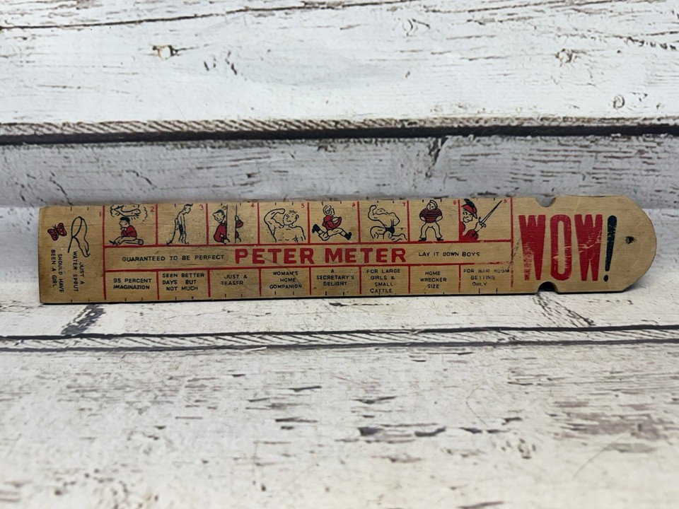 A 1960s Made-in-Japan wooden novelty ruler — genuine vintage kitsch with provenance that makes it an actual collectible, not just a joke.