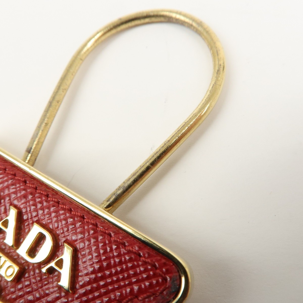 PRADA Triangle Logo Saffiano Leather Metal Bag Charm Red 1PP301