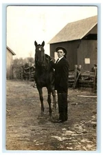 c1910 Man in Suit Horse Stables Farm Wood Fence Barn RPPC Photo Postcard