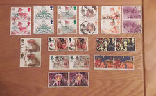GB POST ISSUE, QE11 ERA, 12 USED PAIRS OF CHRISTMAS STAMPS, VARIOUS YEARS.
