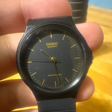 Casio MQ-24 Quartz Analog Wristwatch Water Resistant Black Dial Resin Strap