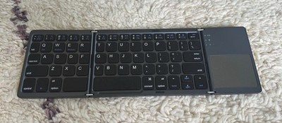 Ares Ultra Slim Pocket Foldable Bluetooth Wireless Keyboard with Touchpad (Bl...