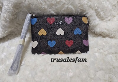  Coach Corner Zip Wristlet In Signature Canvas With Heart Print 