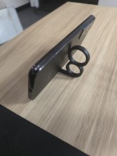 Universal phone holder and pinky saver, 2 per order 