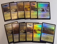 12x PLAINS basic lands (various art) FOIL - NM - Battle for Baldur's Gate mtg