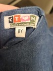 Girls blue denim dress size 8 exc worn once ribbons on side — photo 3