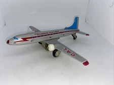 Vintage TIN FRICTION TOYAEORPLANE / AIRPLANE labeled OVERSEAS AIRLINES MF104 ZZ8