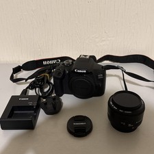 Canon EOS 2000D Digital SLR Camera with 35mm Yongnuo lens 