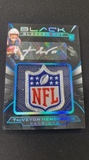 Treveyon Henderson 1/1 Shield Rookie Auto. 2025-2026 Panini Blacked Out