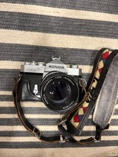 UNTESTED Konica Autoreflex T 35mm SLR Film Camera 135mm f/3.5 lens.