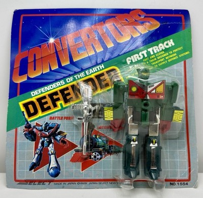 Convertors Defenders of The Earth First Track converts to Train Brand New