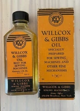 Vintage Willcox & Gibbs sewing machine oil bottle (with original oil) & box