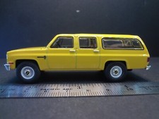 Greenlight 1987 Chevrolet Suburban K20 Custom Deluxe yellow - Loose 1:64