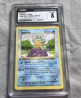 SQUIRTLE 1st Edition Base Set Shadowless Pokemon Card 63/102 Graded CGC 8