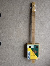 Left handed Chicken bone John cigar box guitar