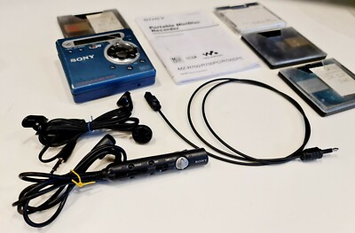 A Sony MZ-R700 Recording Minidisc Walkman in carry case with charger