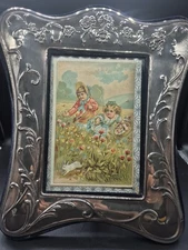 Silverplate Portrait Repousse Photo Frame