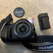 OLYMPUS E 620 14 42mm Lens New Battery Charger 32gb CF Tested