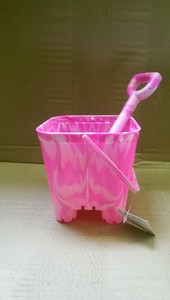 pink bucket and spade