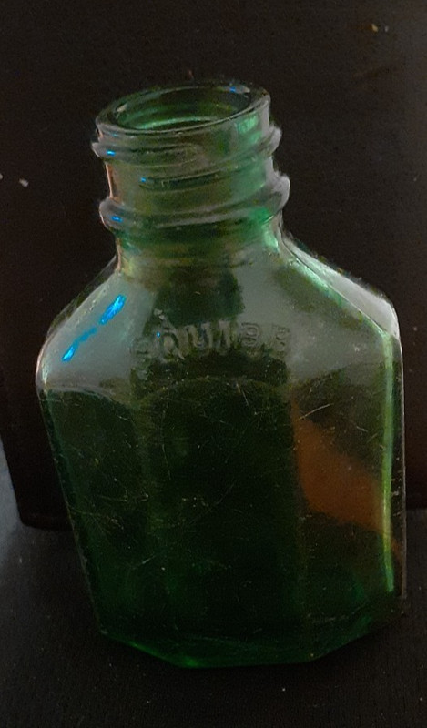 Vintage rare Embossed “SQUIBB / Made in U.S.A.” Green Glass Medicine Bottle