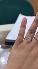 2.5 carat oval lab-grown diamond for sale with certificate and box.