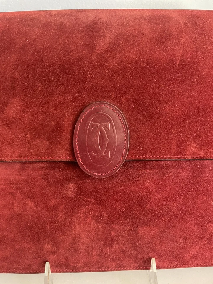 Bolso sin asas Cartier vintage de gamuza borgoña años 70 Foto 2 de 4