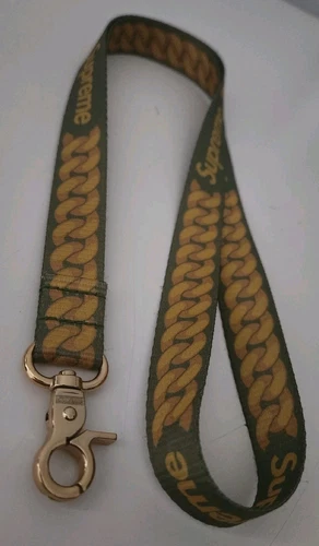 SS22 Supreme Kubanisch Links Band Schlüsselanhänger Olive Gold Zubehör