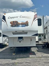 2011 Copper Canyon by Keystone 314FWRLS – Spacious 5th Wheel with 3 Slides!