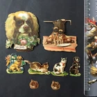 8 Vintage Chromos Dogs Cats 19. century Embossed Cutout Dogs Cats Victorian Sc...