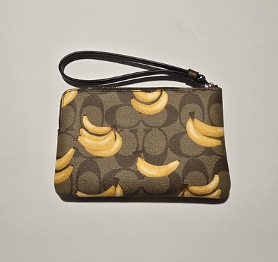 NWT. Coach Corner Zip Wristlet in Signature Canvas with banana