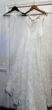 White Wedding Dress Stunning strapless wedding dress. Never Worn. NWOT size 4