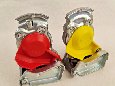 A pneumatic coupling head kit used in the brake systems of trucks and trailers